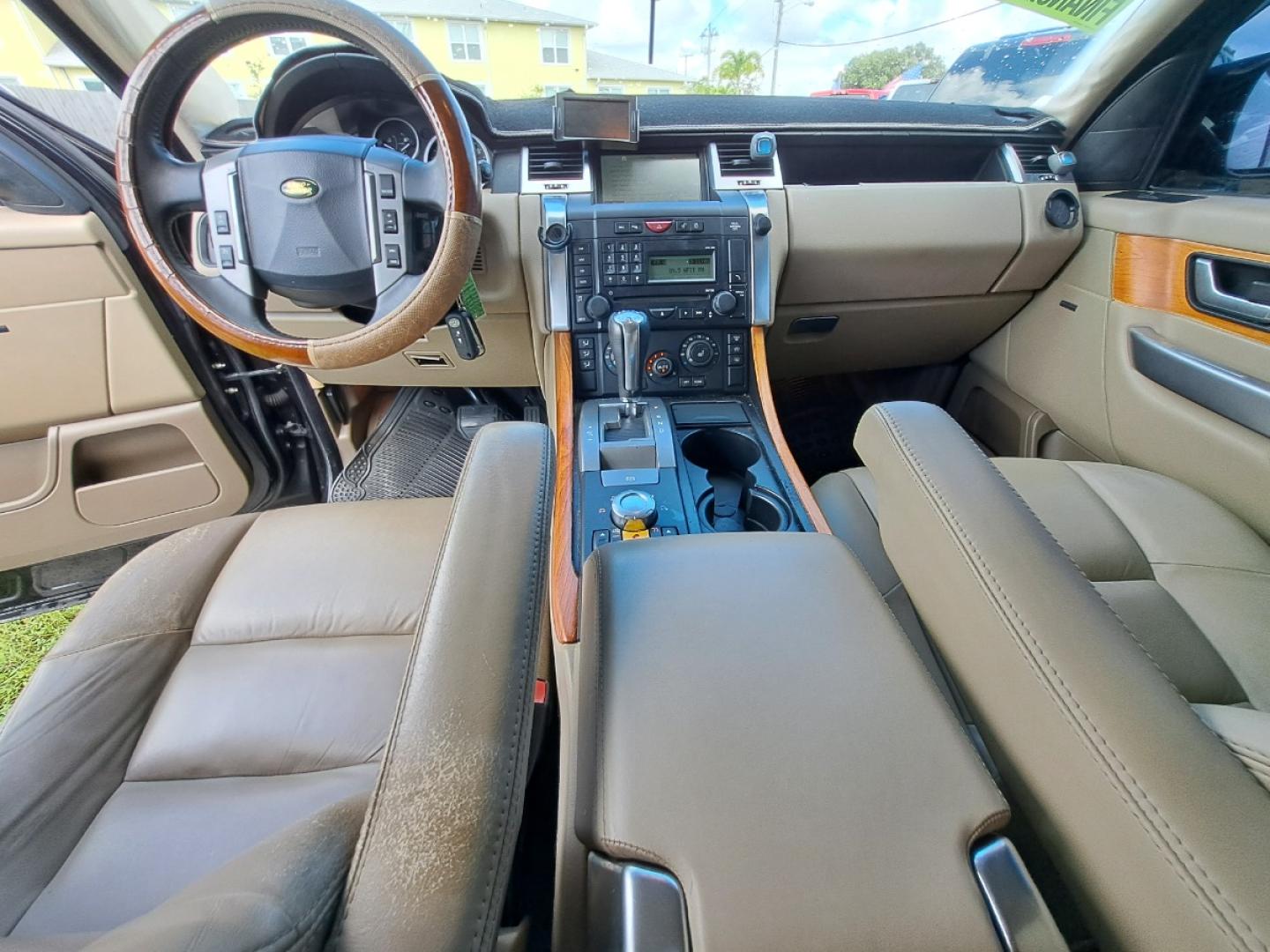 2009 Black Land Rover Range Rover Sport HSE (SALSK25489A) with an 4.4L V8 DOHC 32V engine, 6-Speed Automatic Overdrive transmission, located at 1181 Aurora Rd, Melbourne, FL, 32935, (321) 241-1100, 28.132914, -80.639175 - Photo#3