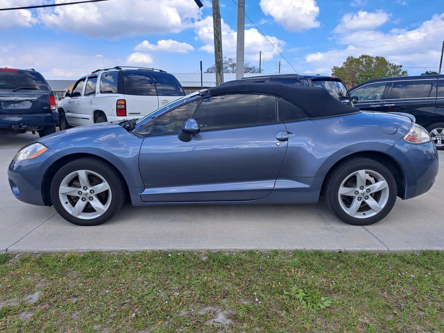 2007 Blue Mitsubishi Eclipse GS Spyder (4A3AL25F07E) with an 2.4L L4 SOHC 16V engine, Automatic transmission, located at 1181 Aurora Rd, Melbourne, FL, 32935, (321) 241-1100, 28.132914, -80.639175 - Photo#0