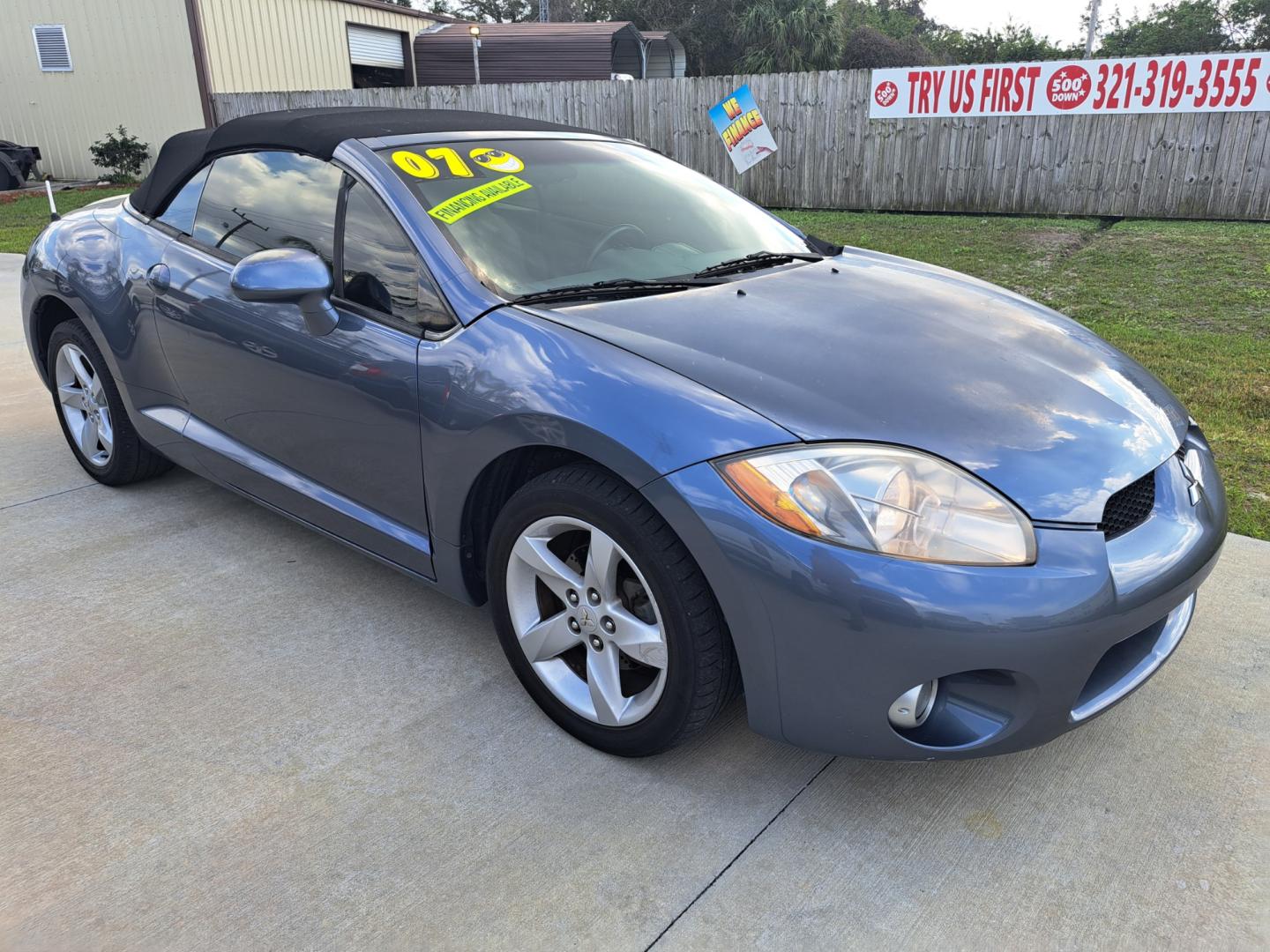 2007 Blue Mitsubishi Eclipse GS Spyder (4A3AL25F07E) with an 2.4L L4 SOHC 16V engine, Automatic transmission, located at 1181 Aurora Rd, Melbourne, FL, 32935, (321) 241-1100, 28.132914, -80.639175 - Photo#2