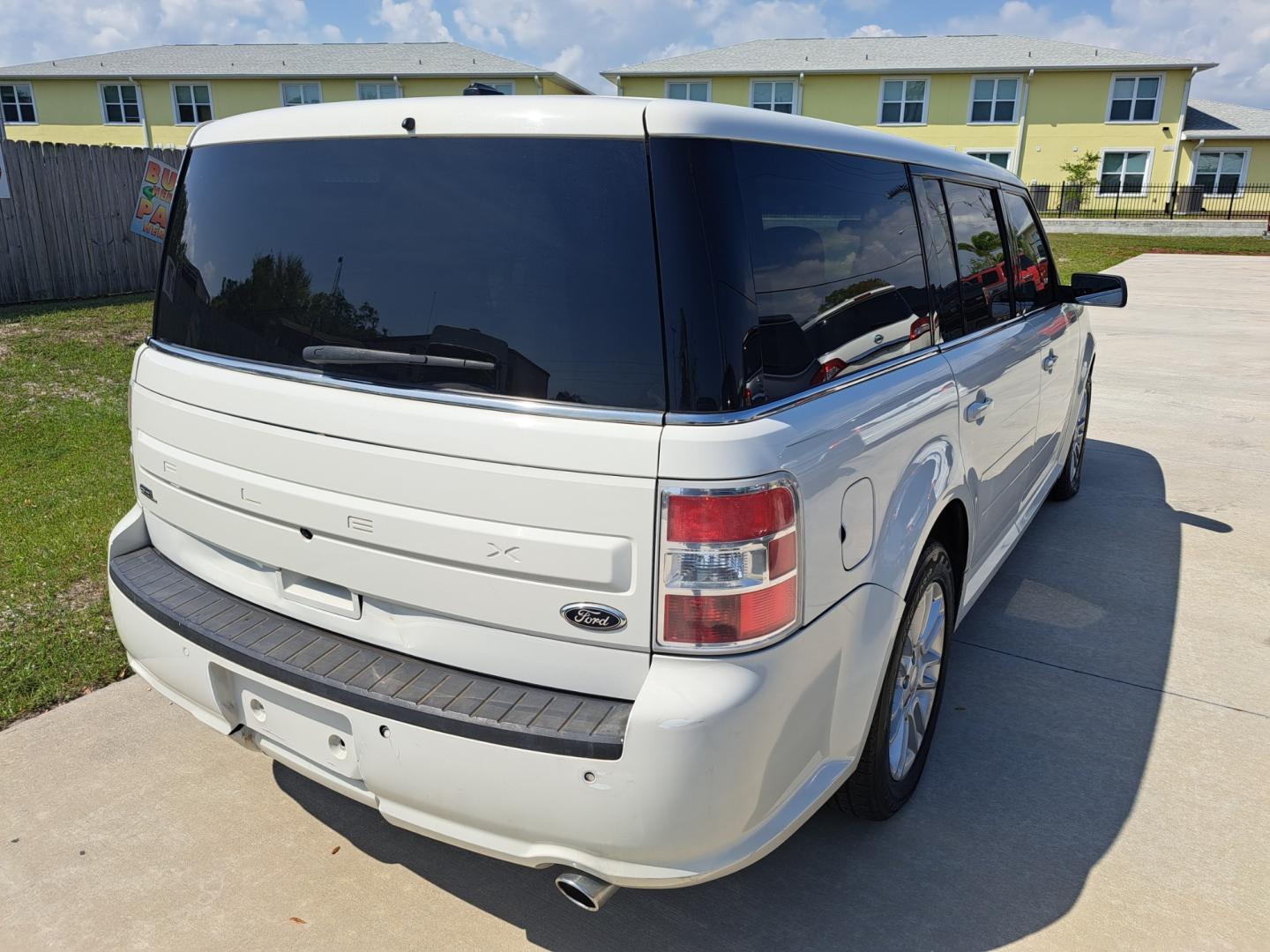 2014 White Ford Flex SEL FWD (2FMGK5C85EB) with an 3.5L V6 DOHC 24V engine, Automatic Overdrive transmission, located at 1181 Aurora Rd, Melbourne, FL, 32935, (321) 241-1100, 28.132914, -80.639175 - Photo#1