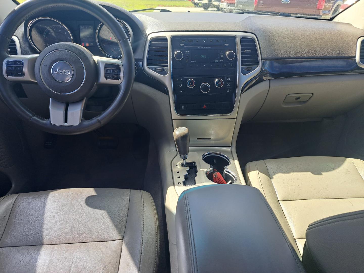 2013 Black Jeep Grand Cherokee Laredo 2WD (1C4RJEAG4DC) with an 3.6L V6 DOHC 24V engine, 5-Speed Automatic transmission, located at 1181 Aurora Rd, Melbourne, FL, 32935, (321) 241-1100, 28.132914, -80.639175 - Photo#3