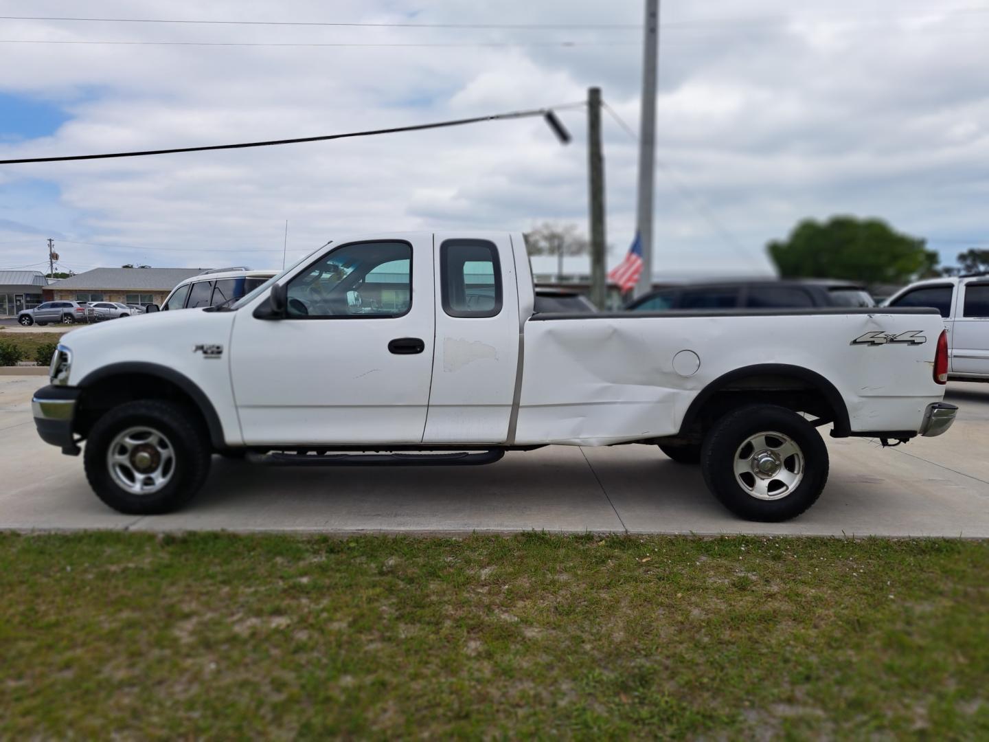 2001 White Ford F-150 Lariat SuperCab Long Bed 4WD (1FTRX18W41K) with an 4.6L V8 SOHC 16V engine, located at 1181 Aurora Rd, Melbourne, FL, 32935, (321) 241-1100, 28.132914, -80.639175 - Photo#0