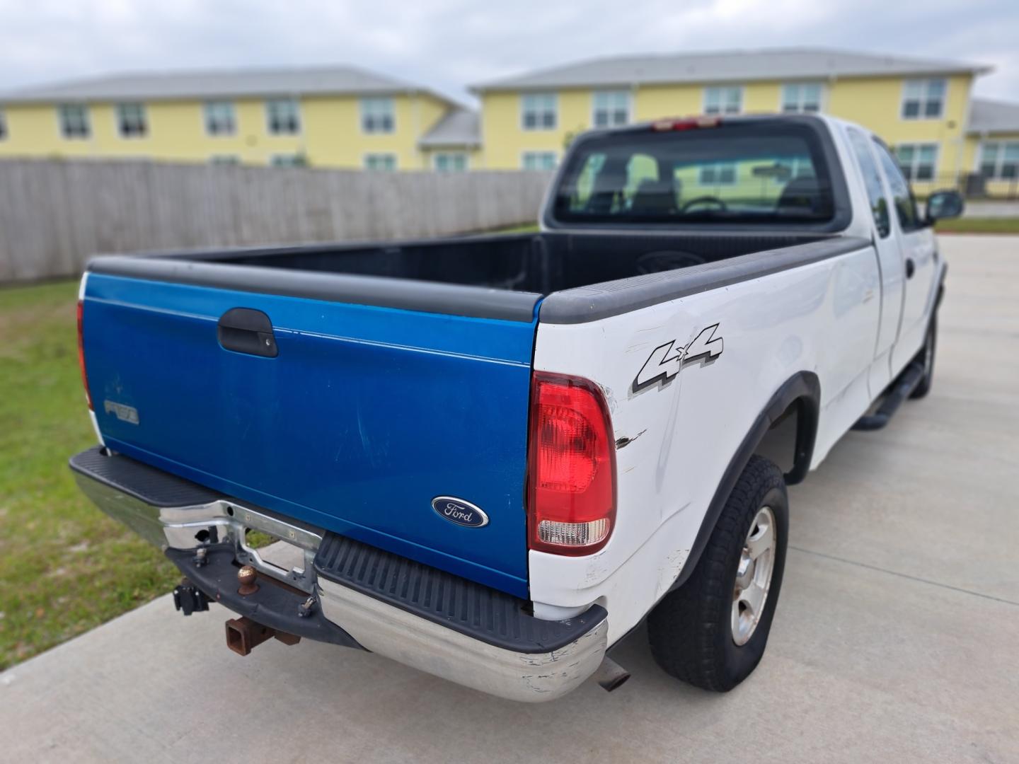 2001 White Ford F-150 Lariat SuperCab Long Bed 4WD (1FTRX18W41K) with an 4.6L V8 SOHC 16V engine, located at 1181 Aurora Rd, Melbourne, FL, 32935, (321) 241-1100, 28.132914, -80.639175 - Photo#1