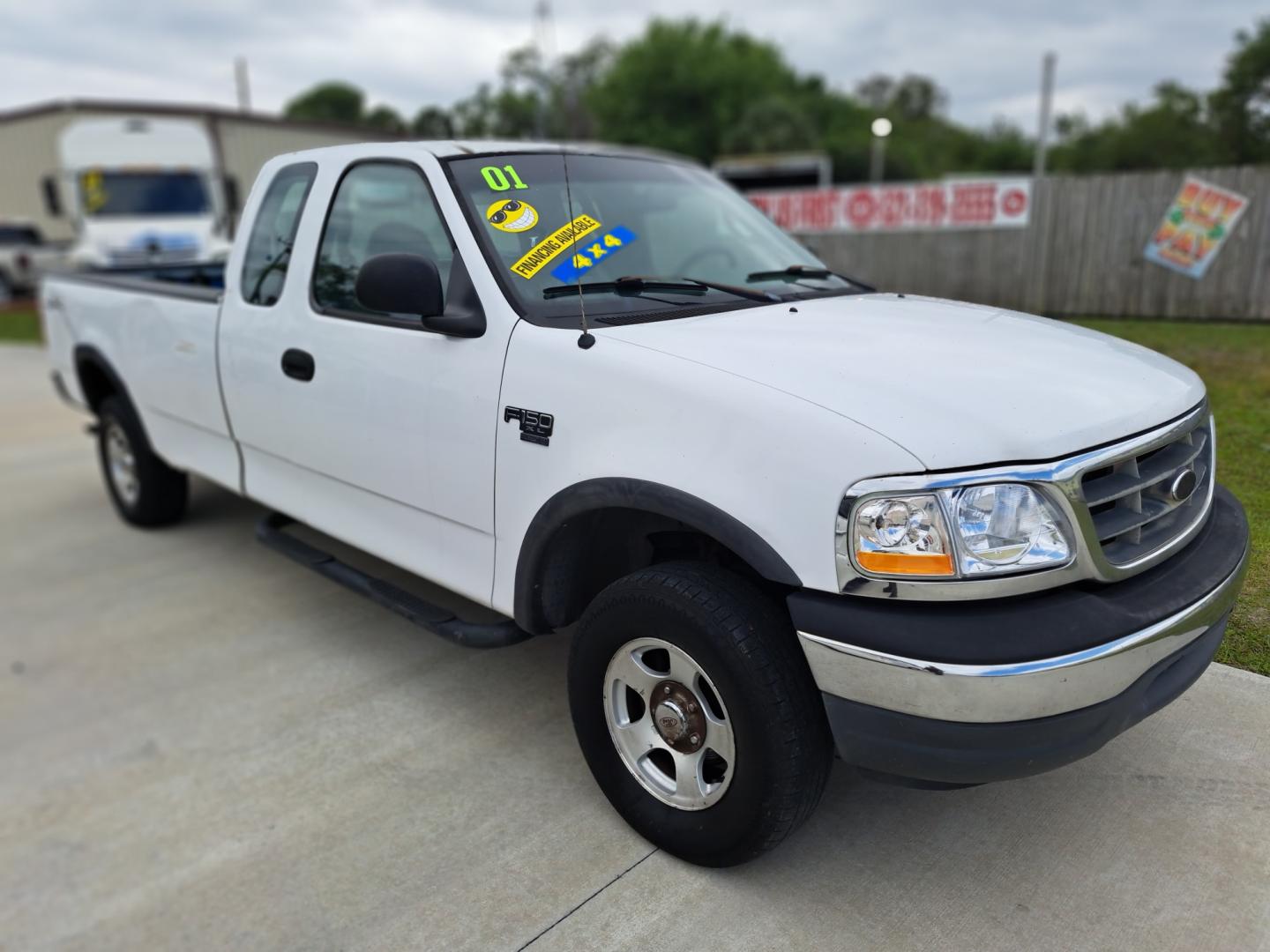 2001 White Ford F-150 Lariat SuperCab Long Bed 4WD (1FTRX18W41K) with an 4.6L V8 SOHC 16V engine, located at 1181 Aurora Rd, Melbourne, FL, 32935, (321) 241-1100, 28.132914, -80.639175 - Photo#2