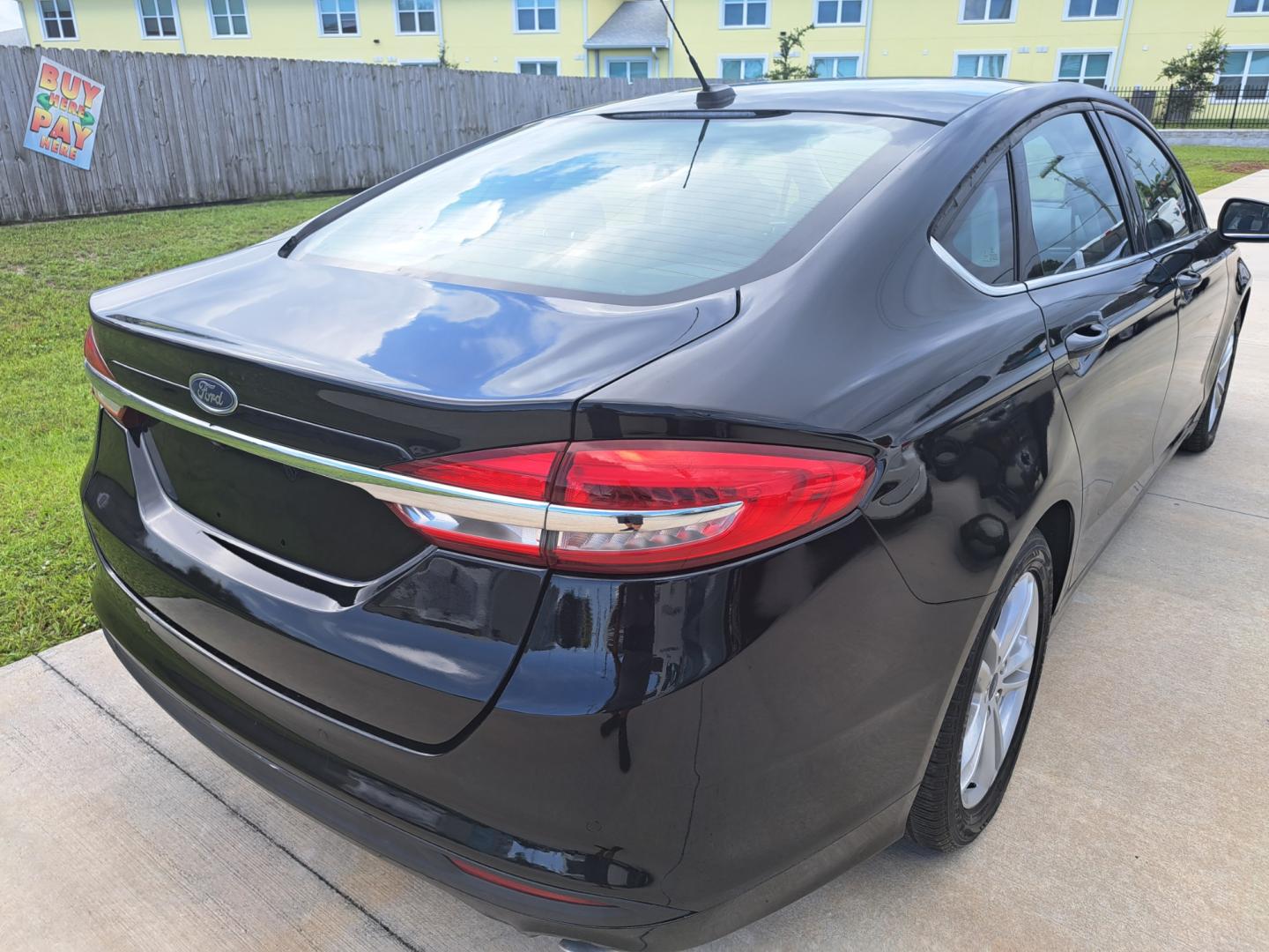 2018 Black Ford Fusion SE (3FA6P0HD5JR) with an 1.5L L4 DOHC 16V engine, 6A transmission, located at 1181 Aurora Rd, Melbourne, FL, 32935, (321) 241-1100, 28.132914, -80.639175 - Photo#1