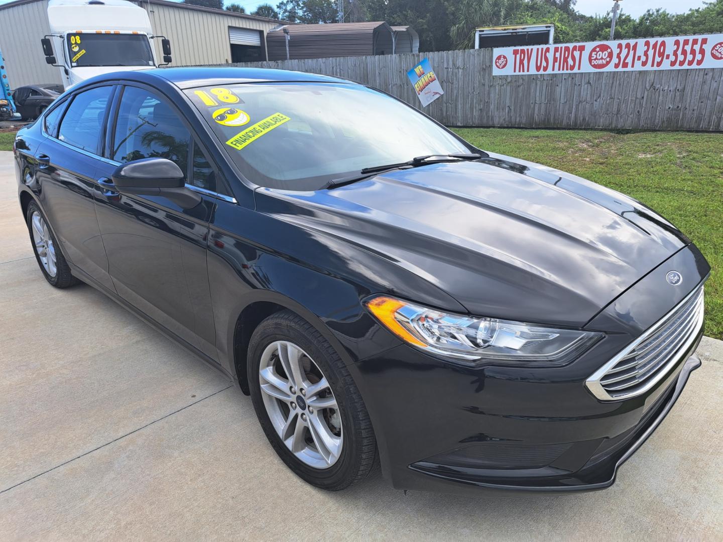 2018 Black Ford Fusion SE (3FA6P0HD5JR) with an 1.5L L4 DOHC 16V engine, 6A transmission, located at 1181 Aurora Rd, Melbourne, FL, 32935, (321) 241-1100, 28.132914, -80.639175 - Photo#2