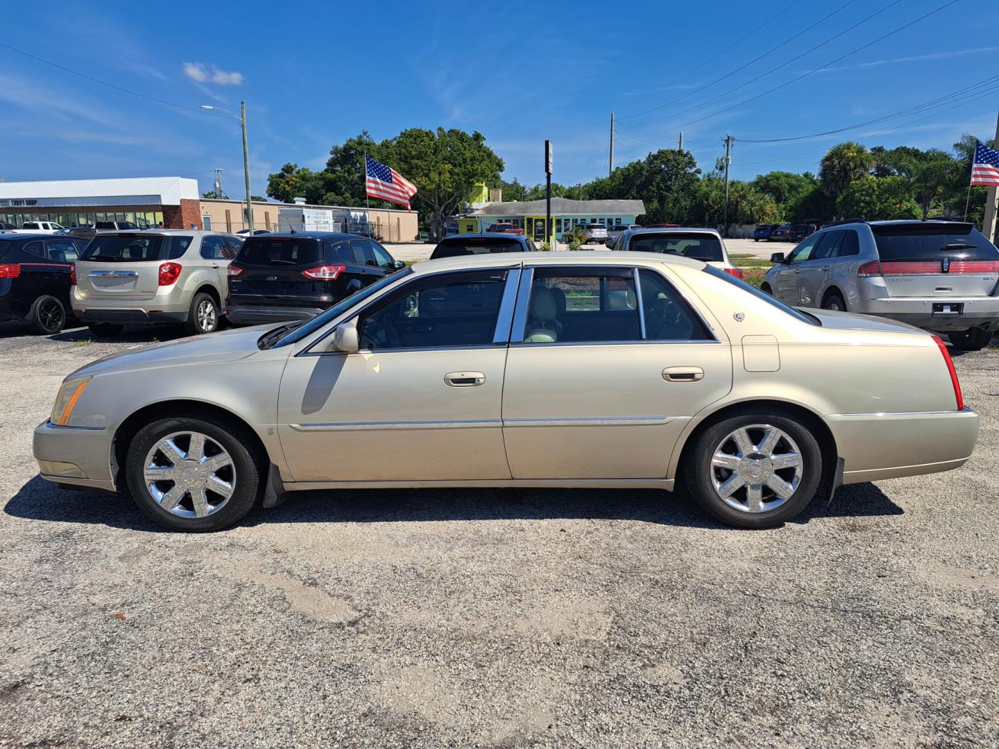 2007 Gold Cadillac DTS Luxury 1 (1G6KD57Y37U) with an 4.6L V8 DOHC 32V engine, 4-Speed Automatic Overdrive transmission, located at 1181 Aurora Rd, Melbourne, FL, 32935, (321) 241-1100, 28.132914, -80.639175 - Photo#0