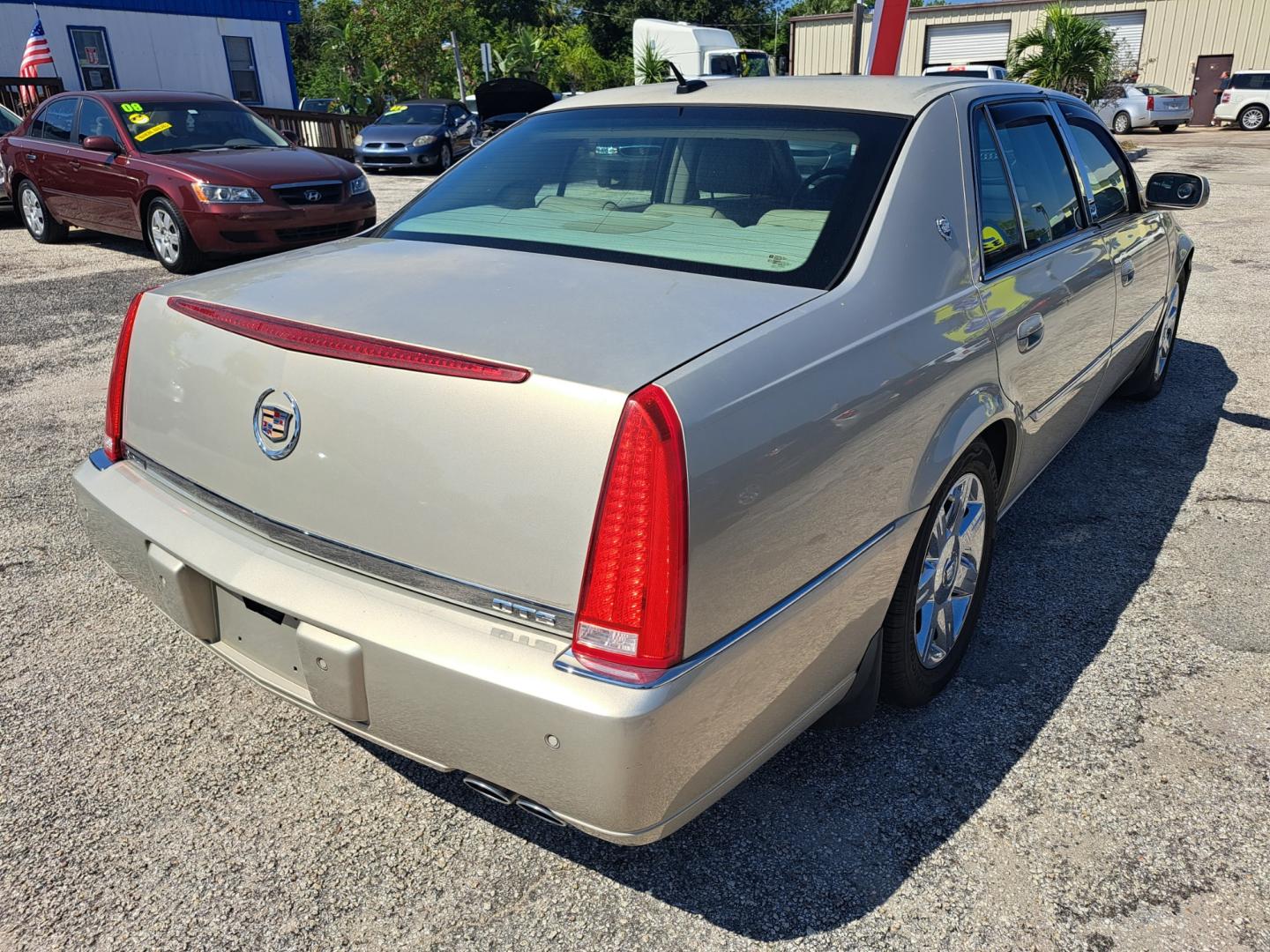 2007 Gold Cadillac DTS Luxury 1 (1G6KD57Y37U) with an 4.6L V8 DOHC 32V engine, 4-Speed Automatic Overdrive transmission, located at 1181 Aurora Rd, Melbourne, FL, 32935, (321) 241-1100, 28.132914, -80.639175 - Photo#1