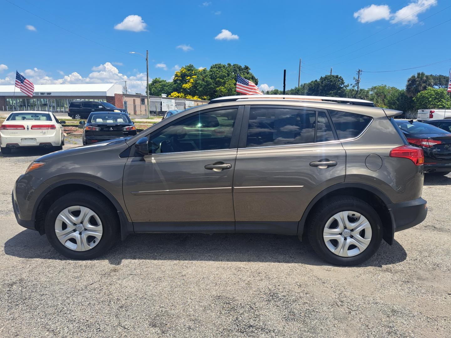 2014 Silver Toyota RAV4 LE FWD (JTMZFREV9ED) with an 2.5L L4 DOHC 16V engine, 6-Speed Automatic transmission, located at 1181 Aurora Rd, Melbourne, FL, 32935, (321) 241-1100, 28.132914, -80.639175 - Photo#0